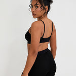 Our Ribbed Boxer in Black is the ideal choice for those seeking more coverage. With its high-rise waist and comfortable, full-coverage design, this boxer is sure to become a staple in your collection. The ribbed fabric provides a tailored fit while the elastic waistband, adorned with our signature logo, ensures a secure, all-day hold. Whether you're relaxing at home or getting ready for bed, these boxers offer unmatched comfort.