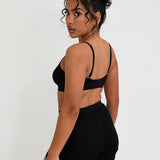 Our Ribbed Boxer in Black is the ideal choice for those seeking more coverage. With its high-rise waist and comfortable, full-coverage design, this boxer is sure to become a staple in your collection. The ribbed fabric provides a tailored fit while the elastic waistband, adorned with our signature logo, ensures a secure, all-day hold. Whether you're relaxing at home or getting ready for bed, these boxers offer unmatched comfort.