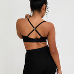 Experience the ultimate in soft support with our Cotton Lyocel Ribbed Bralet. This bralet features a flattering scoop neckline and adjustable 2-way straps for a customised fit. The seamless design ensures smooth lines under any outfit, making it an ideal choice for both lounging and layering. The ribbed texture adds a touch of sophistication, while the breathable Lyocel, cotton, and spandex blend keeps you comfortable all day long.