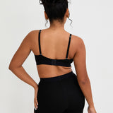Our Ribbed Boxer in Black is the ideal choice for those seeking more coverage. With its high-rise waist and comfortable, full-coverage design, this boxer is sure to become a staple in your collection. The ribbed fabric provides a tailored fit while the elastic waistband, adorned with our signature logo, ensures a secure, all-day hold. Whether you're relaxing at home or getting ready for bed, these boxers offer unmatched comfort.